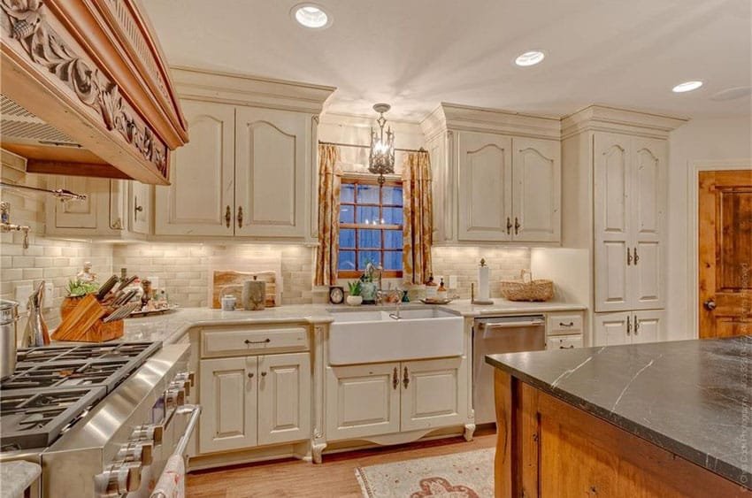 cream-cabinet-kitchen-with-black-soapstone-counter-island