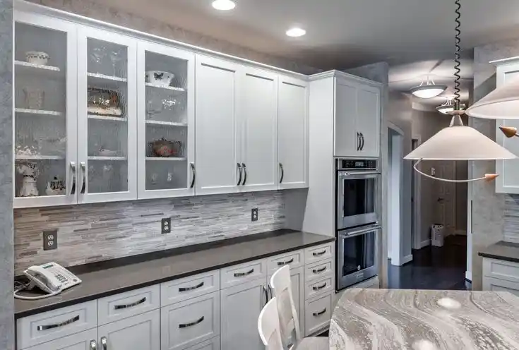kitchen with white cabinets and grey countertops