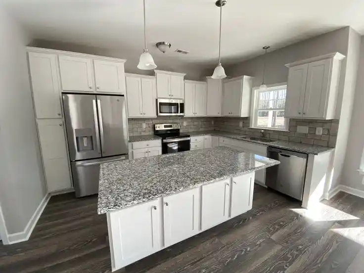 white cabinets and grey countertops