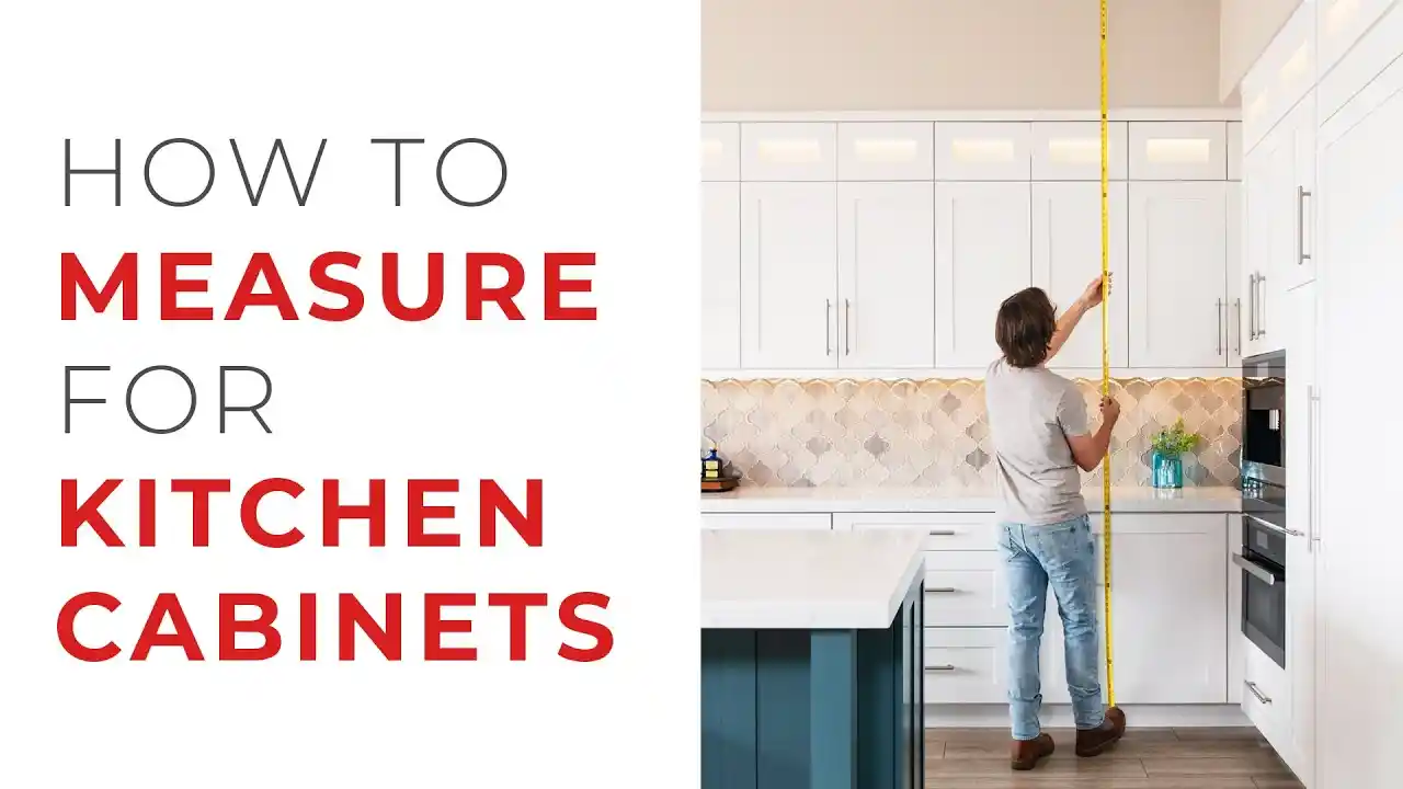 Homeowner using a tape measure to check floor-to-ceiling height before measuring kitchen cabinets