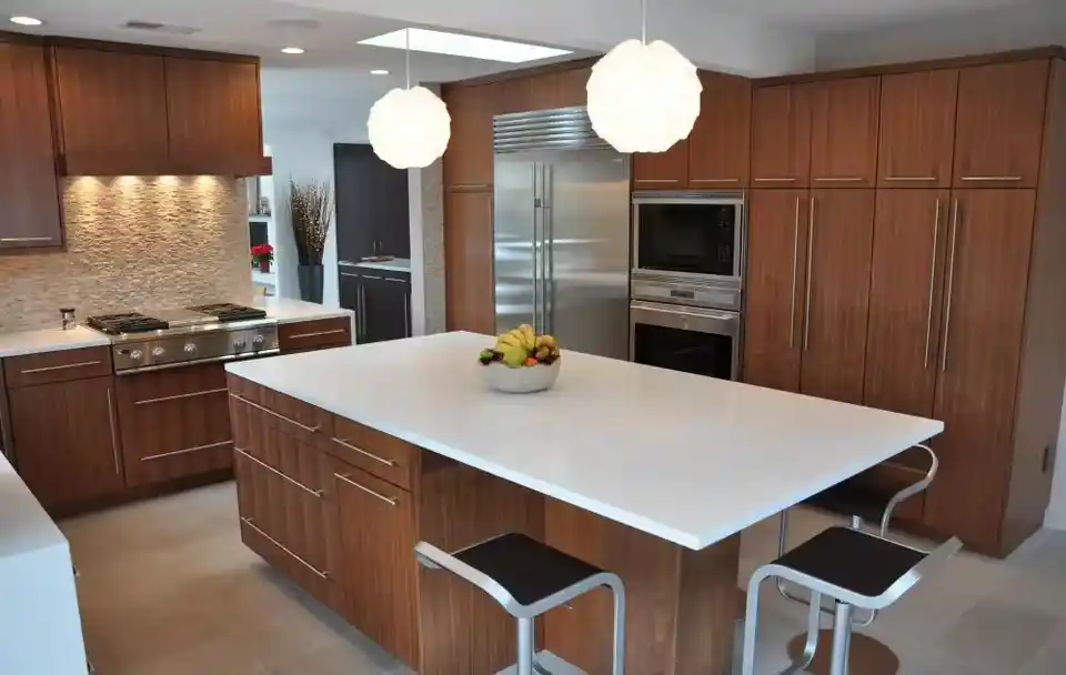 natural wood cabinets with white countertops