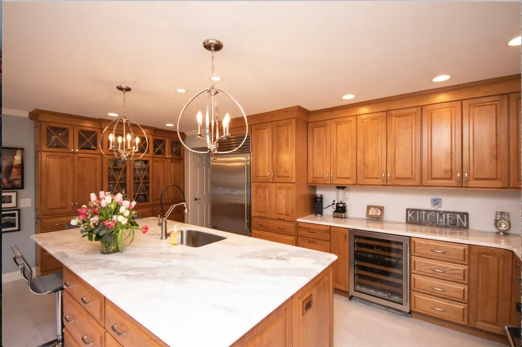 white countertops with wood cabinets